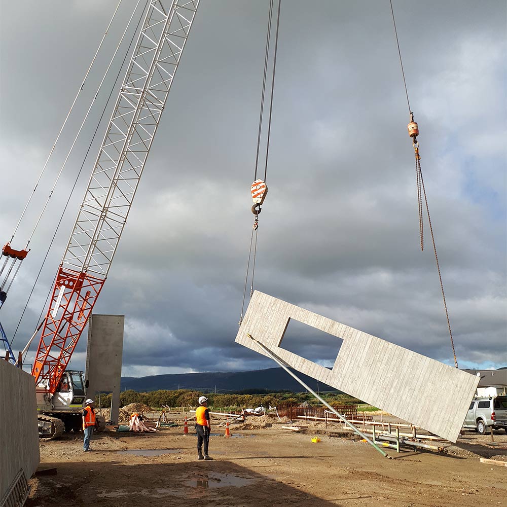 Homestead Construction precast concrete panel being lifted by crane OneSchool Palmerston North Campus